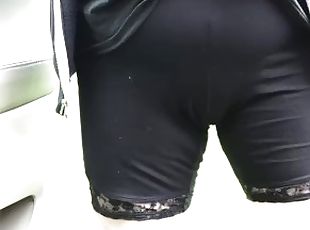 Desperate leggings pee along the road