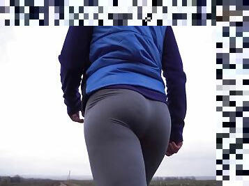 Amateur with a nice ass hiking in tight pants, view from below