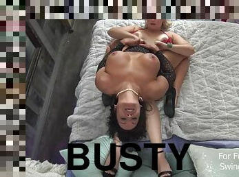 Busty lesbian MILFs licking and enjoying a strap on in exclusive amateur swinger video - Homemade
