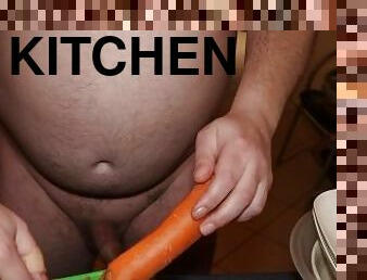 Naked in kitchen