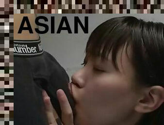Cute asian inmate gives blowjob to prison guard in toilet