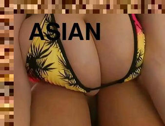 Asian with giant tits in bikini