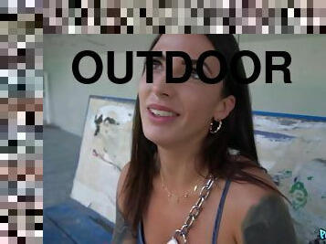 Inked brunette with big juggs fucks Erik outdoors