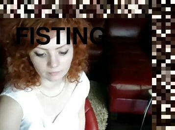 Redhead girl loves fisting both holes on webcam