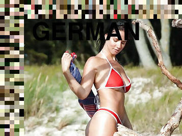 German wife model Joelina strips naked on the beach