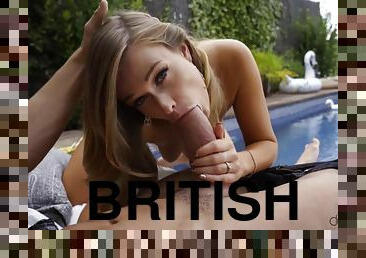 Sexy British chick pleasuring tattooed guy by the pool