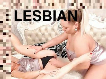 Lesbians kissing and having fun with lovense vibrator
