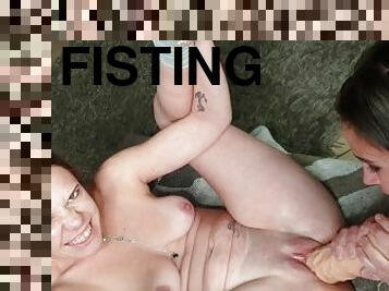 Getting my tiny pussy stretched with a fist and a giant dildo