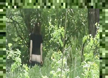 Amateur babe is pissing in the reality forest