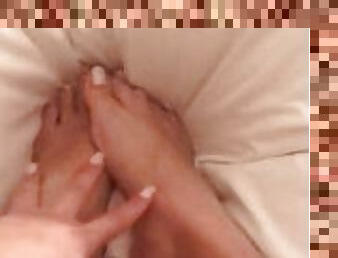 ASIAN GIRL PLAYING WITH FEET