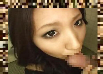 Japanese girl in bathroom takes load on tongue