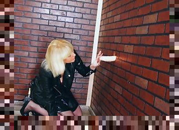Blonde bitch gets dirty in the glory hole room
