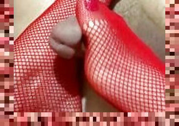 Red fishnet squeezing the cum out.