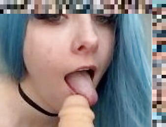 Petite blue hair girl sucks dildo