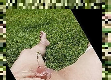 pissing on myself and playing with my cock outside naked