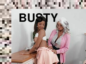 Busty granny involves shy ebony teen into her lesbian games