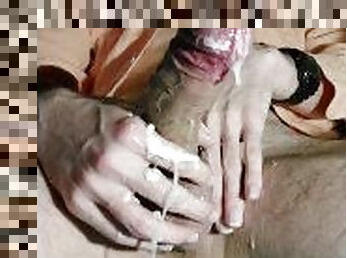 Close up failing to resist cumming with creamy lube and a cock ring