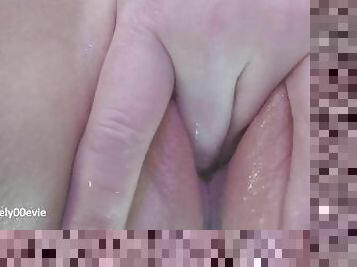 Closeup of hot girl fingering her dripping wet pink pussy with pussy orgasm contractions