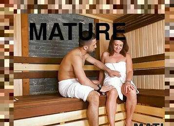 MATURE4K. Chubby mature woman has her pussy filled with a mans cock in the sauna