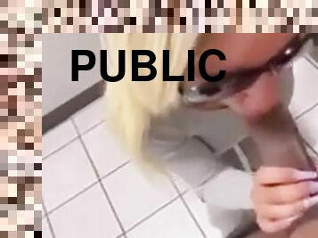 BBC fucks a horny blonde in a public bathroom