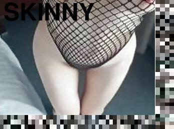 Sexy fishnet bodysuit tease of a petite chick with pale body and perfect small tits