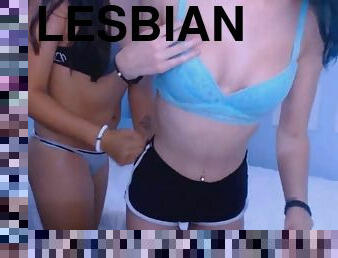 Lovely lesbian kissing while rubbing their pussy