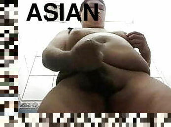 Chubby Asian boy jerks off in public bathroom 