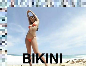 Cute Gravure Idol in a Bikini on the Beach