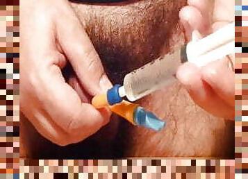 Massage cock with a (very big!!) CH24 Foley catheter and cum