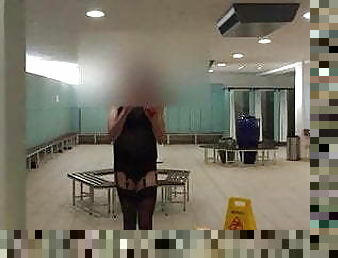 Walk around changing rooms in lingerie.