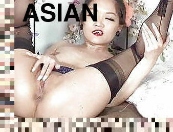 Petite Asian spreads her perfect nylon legs
