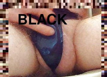 Pissing in my black satin panties.