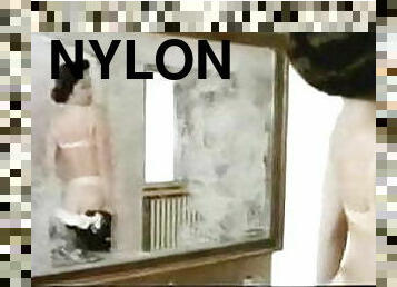 L. Carati in 1979 movie in white bra, panties, stockings