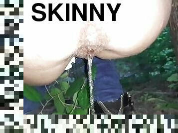 Skinny girl pissing in the forest - IkaSmokS