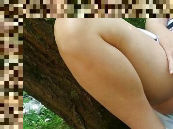 Hot Russian girl touch herself and peeing by the river on a wood!