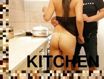 Horny step-mom gives handjob in the kitchen