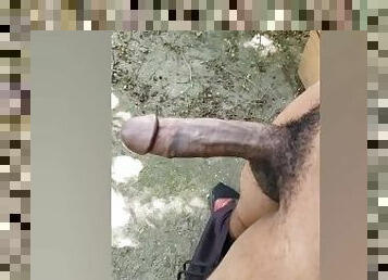 Jerking off outdoors and cumshot