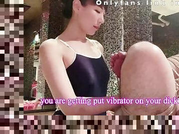 Mistress puts Vibrator on her slave to make him cum