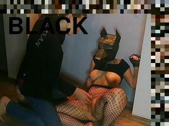 Cute Girl Hiding Behind A Black Dog Mask