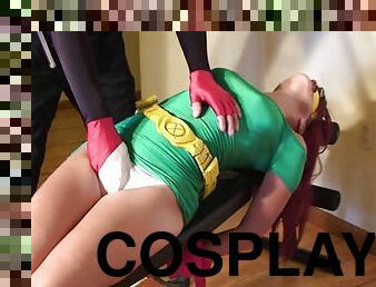 Submissive redhead girl tied and dominated in cosplay fetish scene