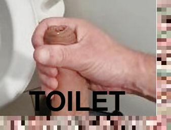 Cuming in the toilet at work.. risky wank!!