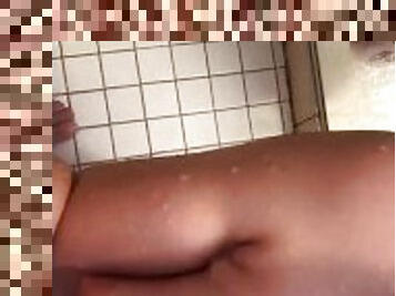 Sucked off in the shower makes him cum on her tits