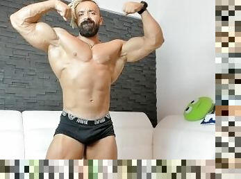 ripped muscles oiling and flexing hard naked