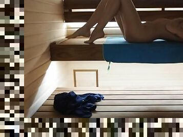 Babe masturbating hairy pussy in the sauna