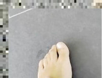 Pretty male feet getting creamed