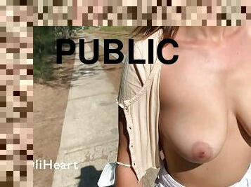 Beauty walks topless in public