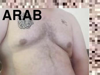 Fat arab infront of computer