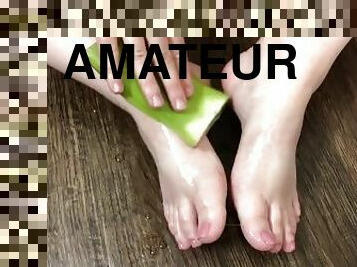 Sexy Teen Rubs Her Feet in Slippery Aloe Vera