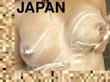 Naughty Japanese SchoolGirl takes shower naked - wet Asian tits