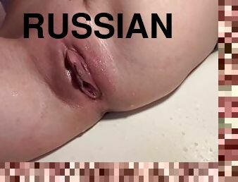 Luscious Russian schoolgirl makes amateur golden shower in the bathroom